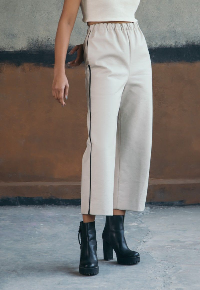 Mannat Gupta’s straight leather pants feature a stretchable waistband, the black leather piping on the sides and inseam pockets make it super functional and level up your dressing skills with this wonderful collections