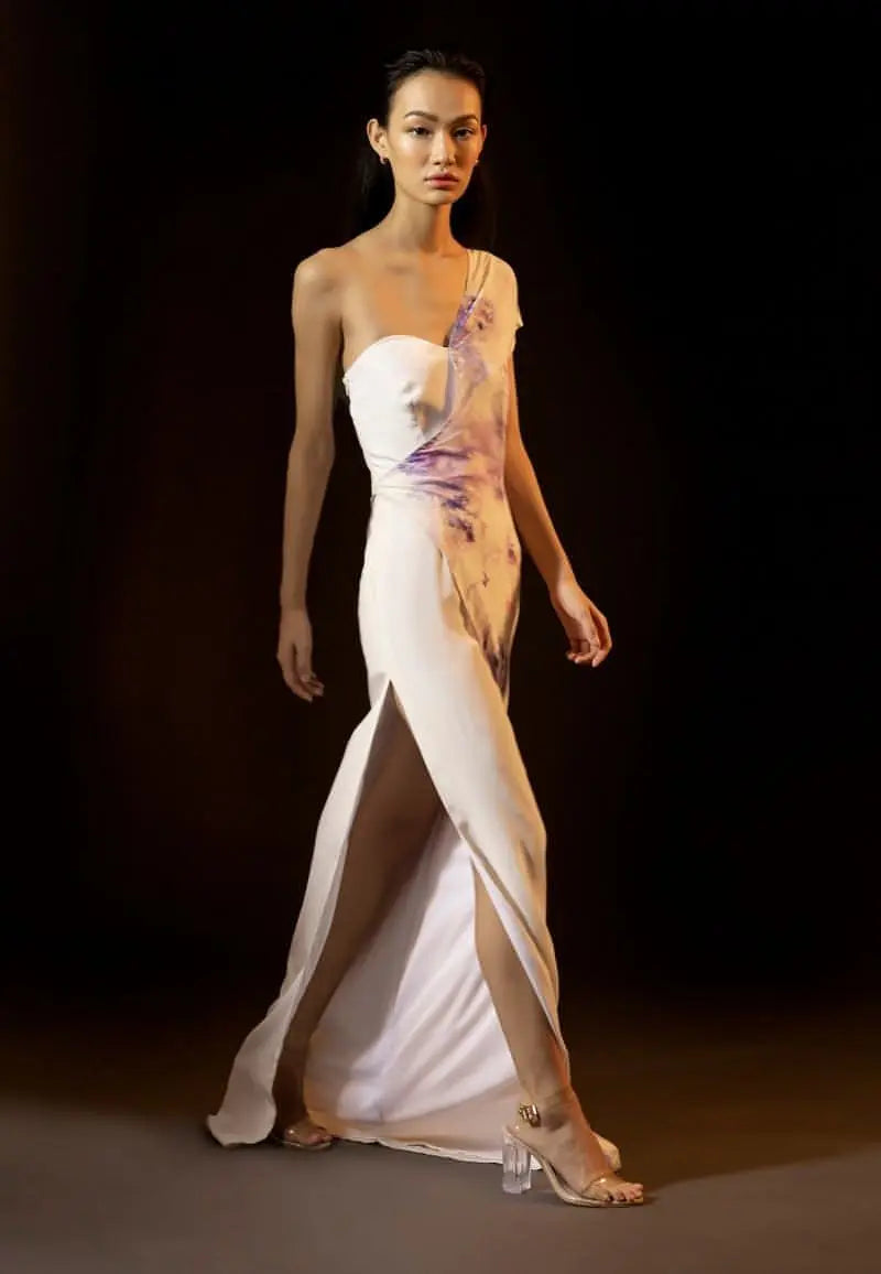 Women's summer special, this one-shoulder maxi dress is perfect for summer brunches and vacations. Made from silk crepe and draped chiffon, the figure-sculpting purple tie-dye print bandeau maxi with white comes with a high side slit. complete the look with heeled sandals and minimal accessories for your next soiree.