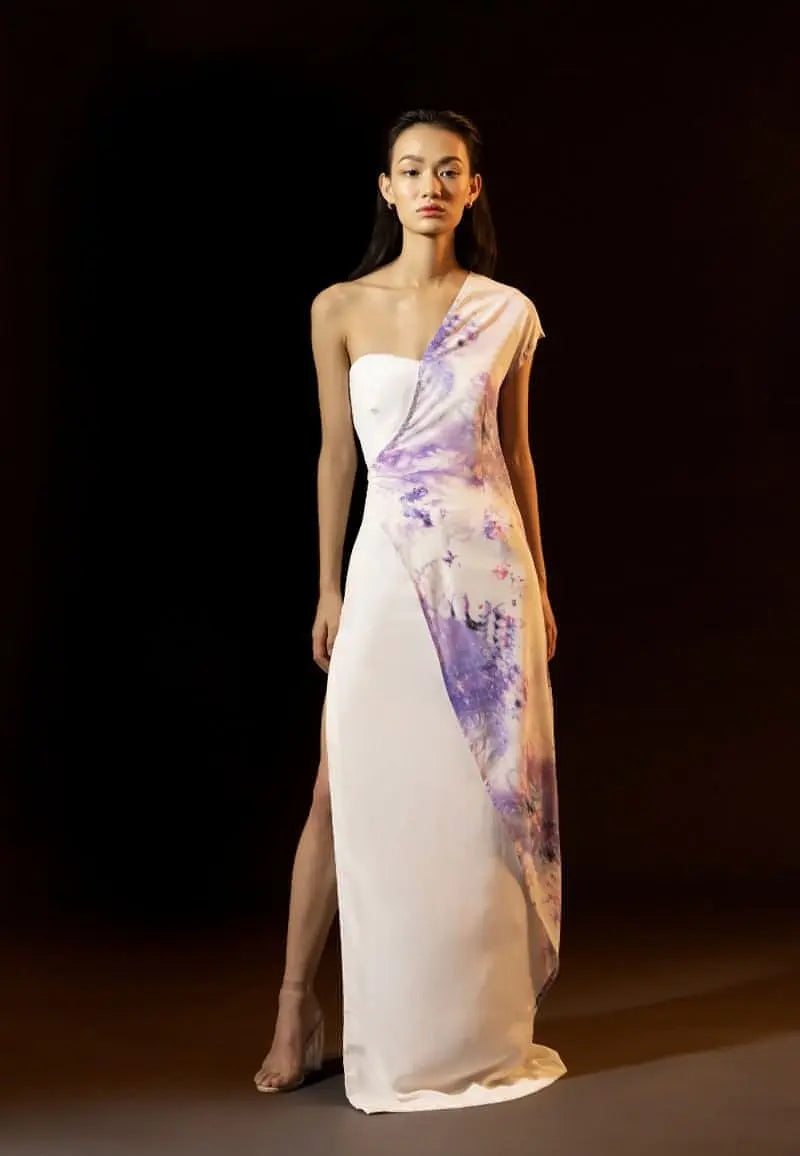 Women's summer special, this one-shoulder maxi dress is perfect for summer brunches and vacations. Made from silk crepe and draped chiffon, the figure-sculpting purple tie-dye print bandeau maxi with white comes with a high side slit. complete the look with heeled sandals and minimal accessories for your next soiree.