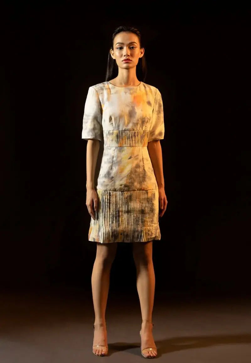 Womens mini dress collection, this half-sleeved mini dress is made from luxe tie-dye silk in grey and yellow. The shoulder pads give it a structured and strong look. Take this versatile piece from day to night or from summer to winter in seconds. Pair it with heeled sandals or flats and minimal gold jewelry to complete the look.